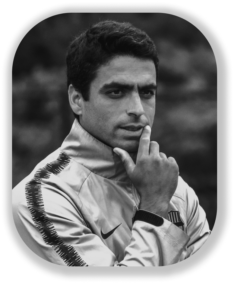 Soccer coach Jorge Reis thinking